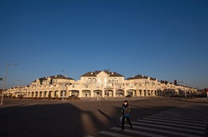 Empty luxury homes line the vacant streets of Kangbashi New Area.