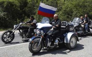 Putin riding an American Harley Davidson motorcycle, because they only things Russia manufactures are fear and political repression.
